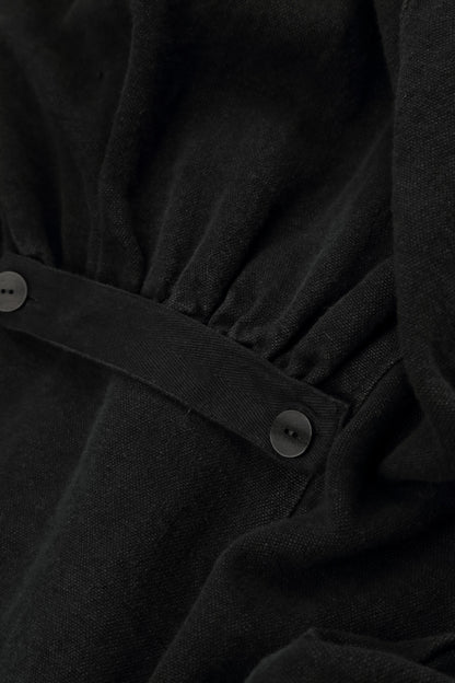 Veste longue en lin noir épais à patte de boutonnage