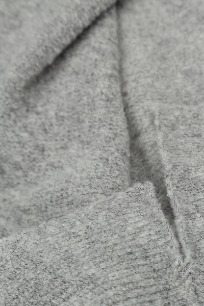 Lockere kastige Strickjacke aus Wolle in Hellgrau