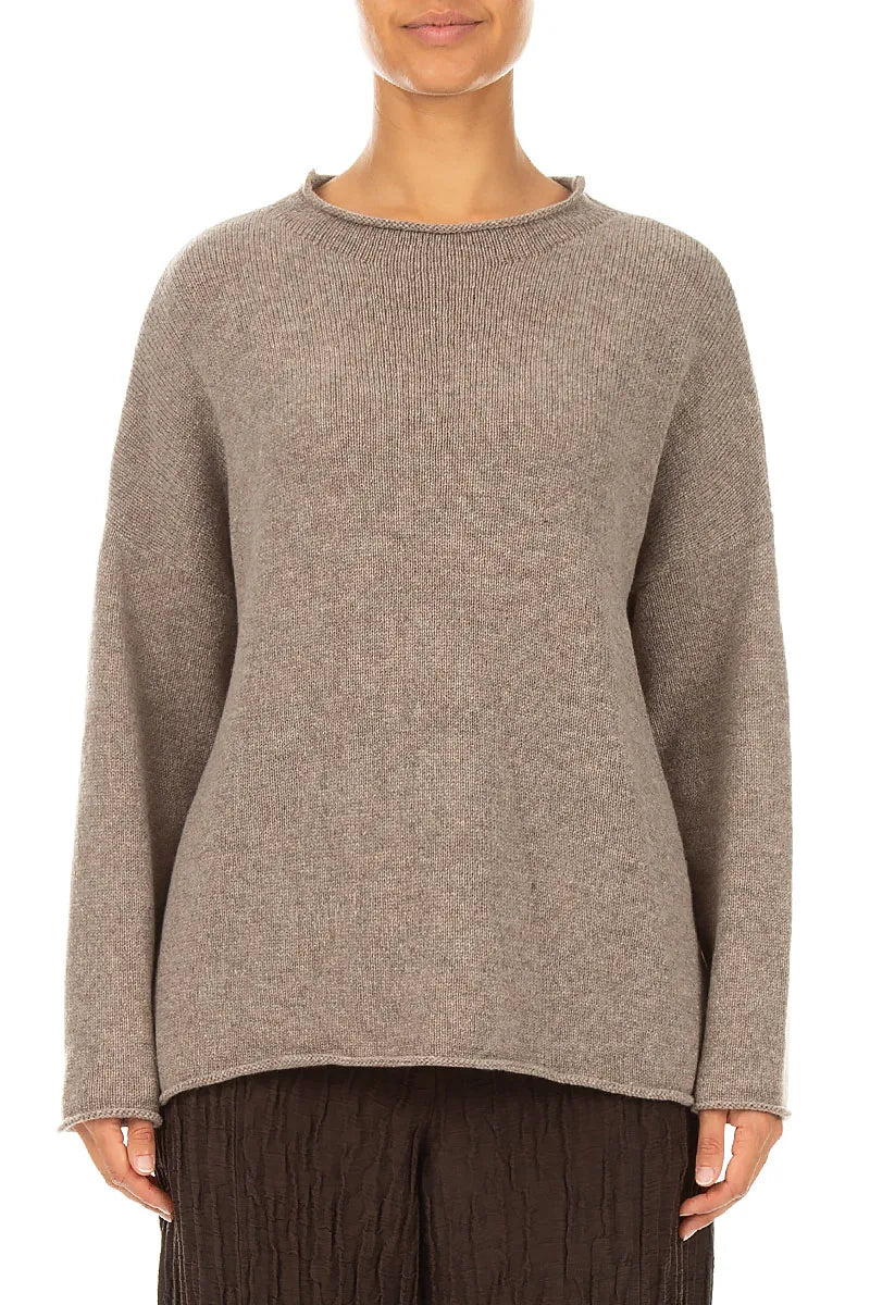 Pull en cachemire beige à bord roulé