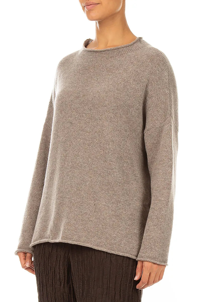 Pull en cachemire beige à bord roulé