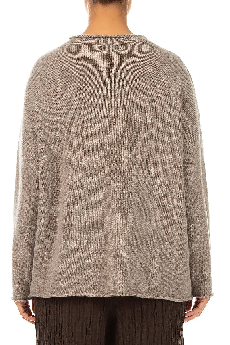 Pull en cachemire beige à bord roulé