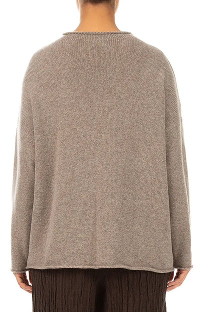 Pull en cachemire beige à bord roulé