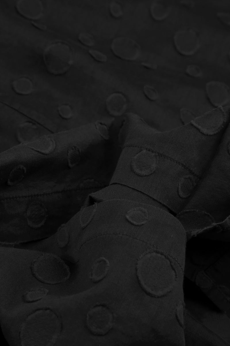Tunique en soie et coton noire à pois superposés